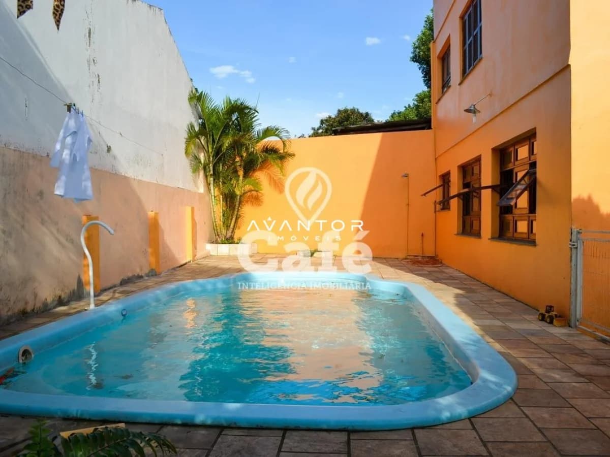 Piscina com área externa murada — Casa com 4 quartos à venda em Duque de Caxias, Santa Maria/RS