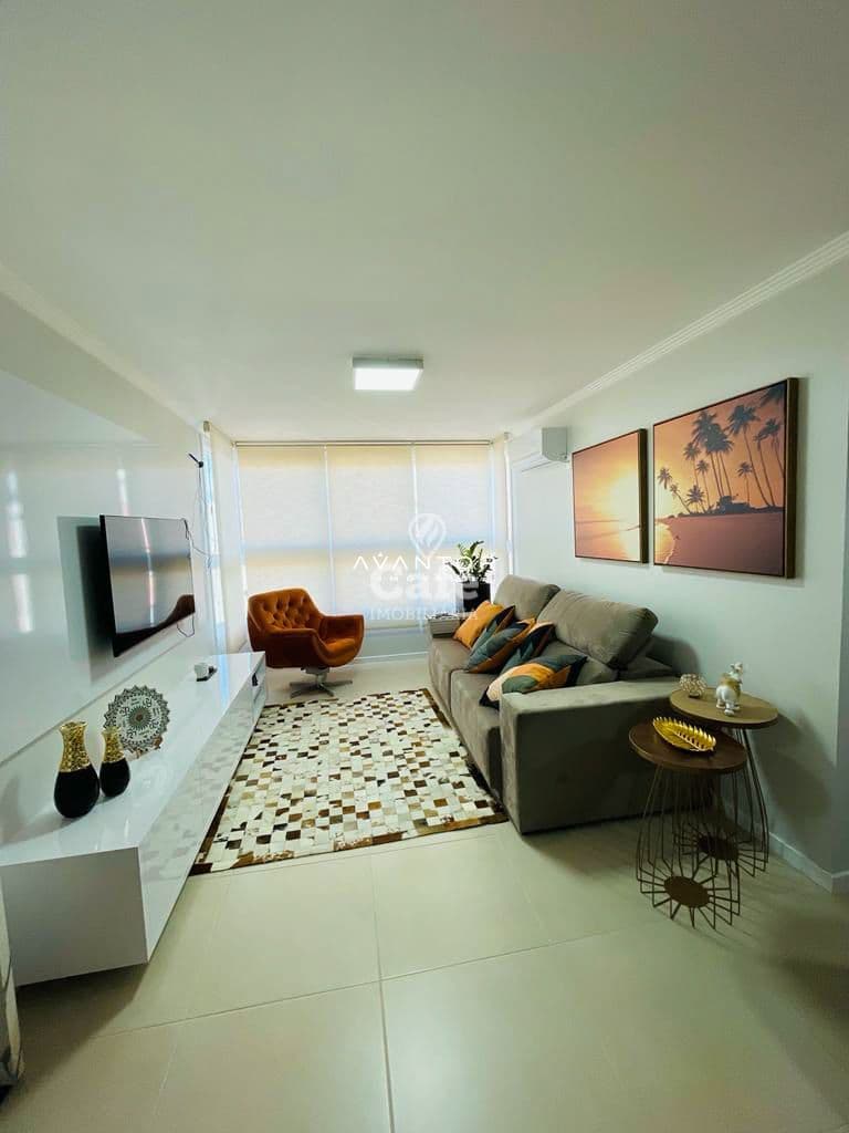 Sala de estar com sofá e poltrona — Apartamento com 2 quartos à venda em Nossa Senhora das Dores, Santa Maria/RS