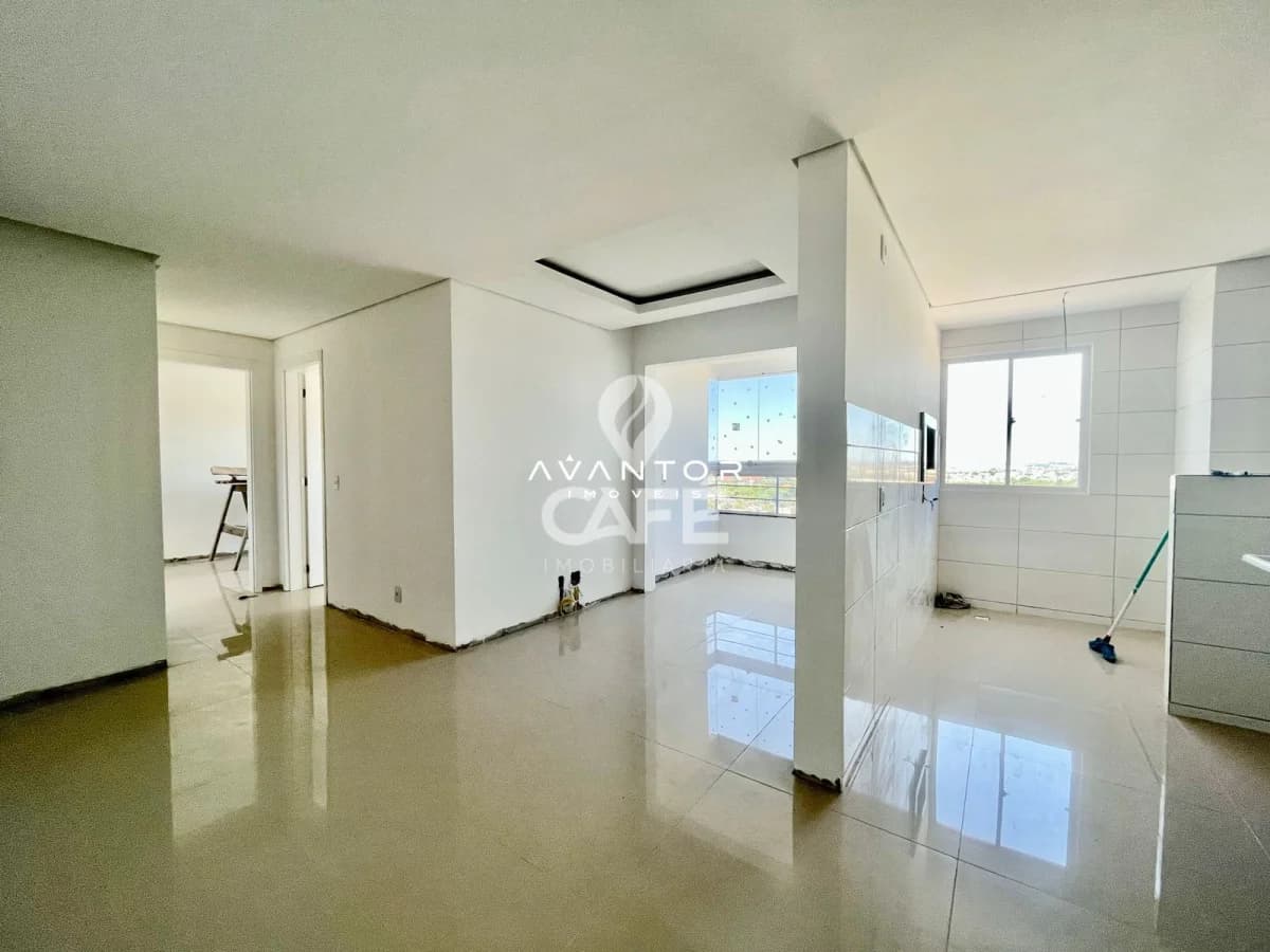 Sala integrada com cozinha e sacada — Apartamento com 2 quartos à venda em Bonfim, Santa Maria/RS