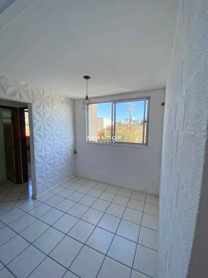 Cozinha com janela e vista externa — Apartamento com 2 quartos à venda em Urlândia, Santa Maria/RS