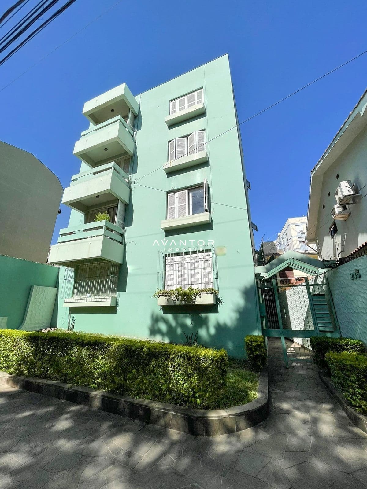 Fachada do prédio com sacadas — Apartamento com 1 quarto à venda em Centro, Santa Maria/RS