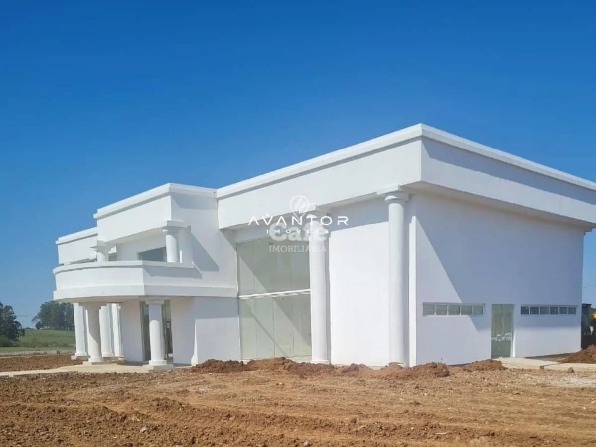 Fachada da casa com arquitetura contemporânea — Terreno à venda no Condomínio Alexandria, em Camobi, Santa Maria/RS