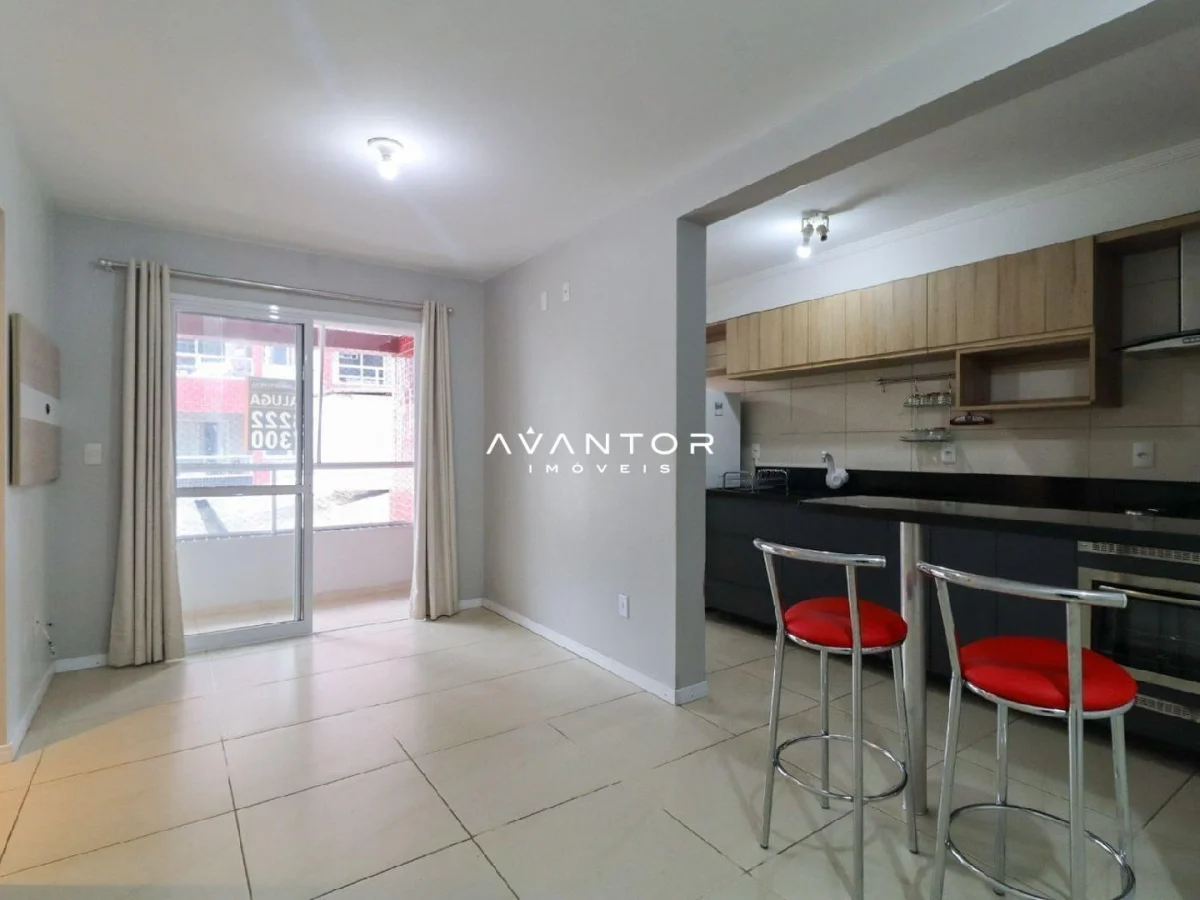 Cozinha integrada à sala com bancada — Apartamento com 1 quarto à venda em Centro, Santa Maria/RS
