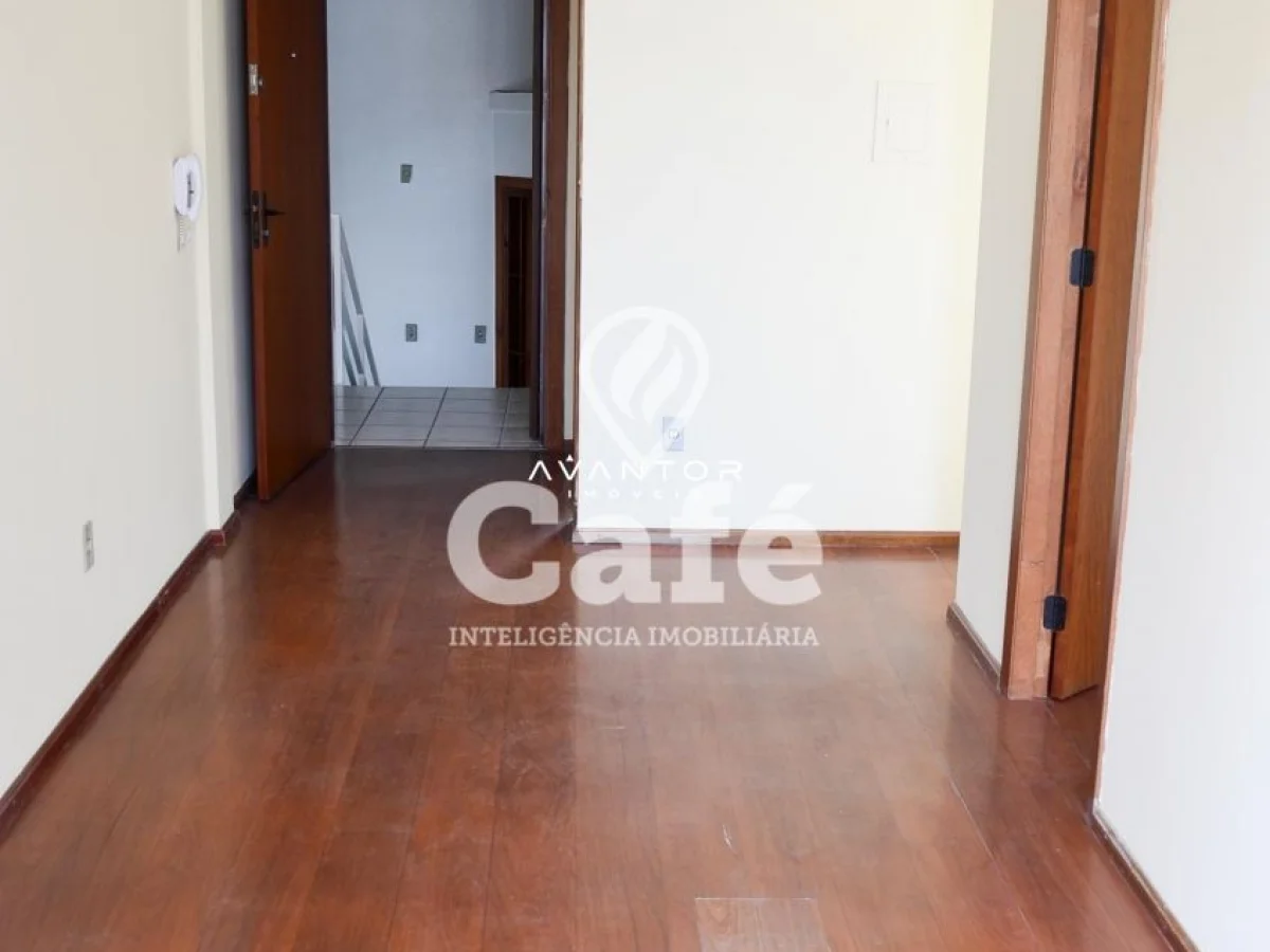 Hall de entrada com piso em madeira — Apartamento com 1 quarto à venda em Nossa Senhora de Fátima, Santa Maria/RS