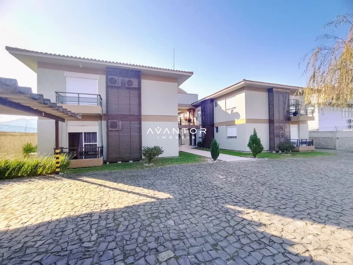 Fachada da casa com garagem — Apartamento com 2 quartos à venda no Residencial La Fenice Morada, em São José, Santa Maria/RS