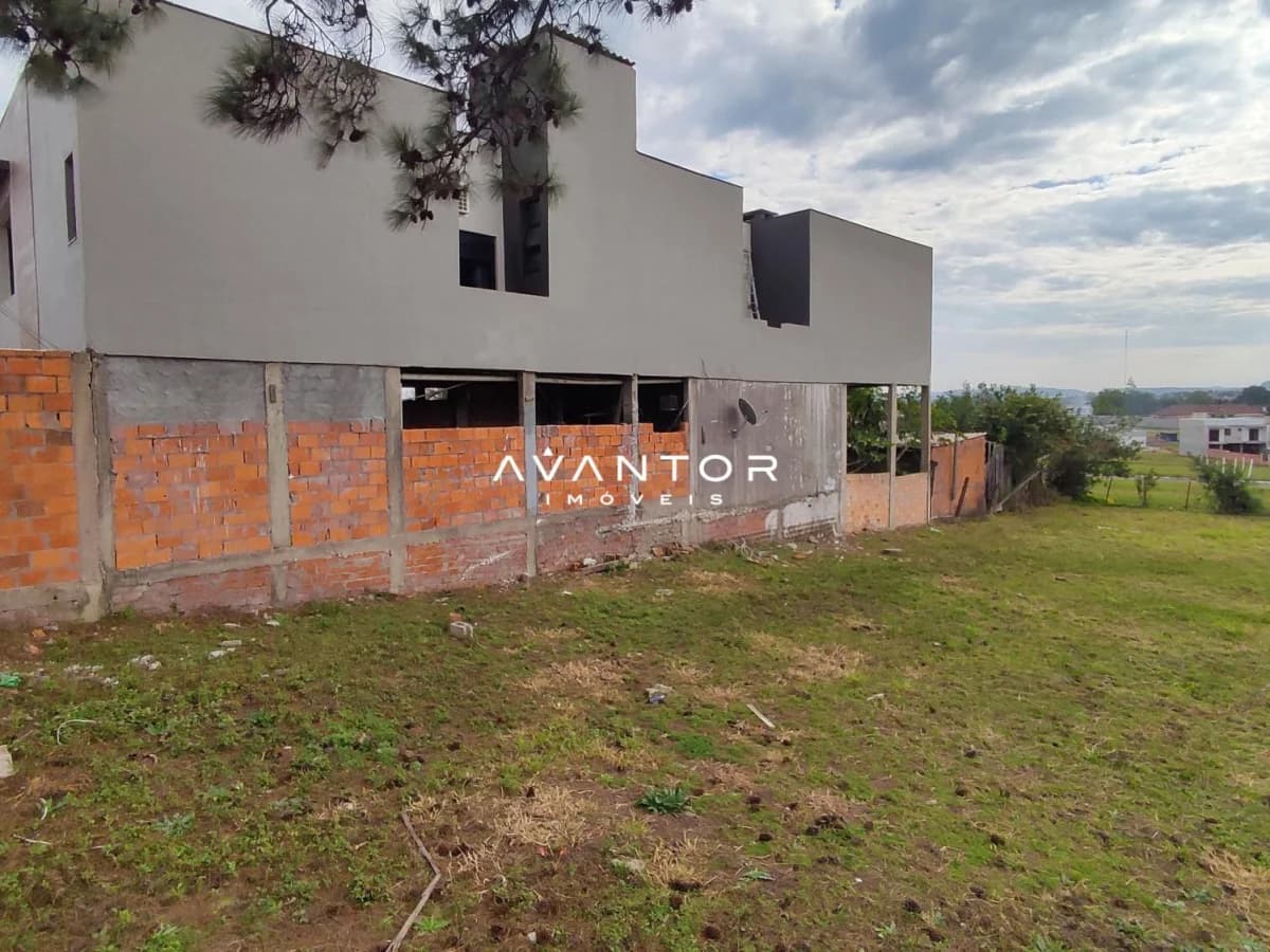 Fachada da casa em construção — Terreno à venda em Pinheiro Machado, Santa Maria/RS