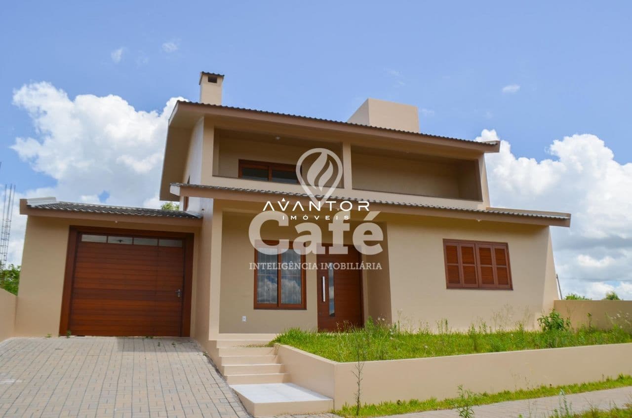 Fachada da casa com garagem — Casa com 3 quartos à venda no Viareggio Residence Club, em São José, Santa Maria/RS