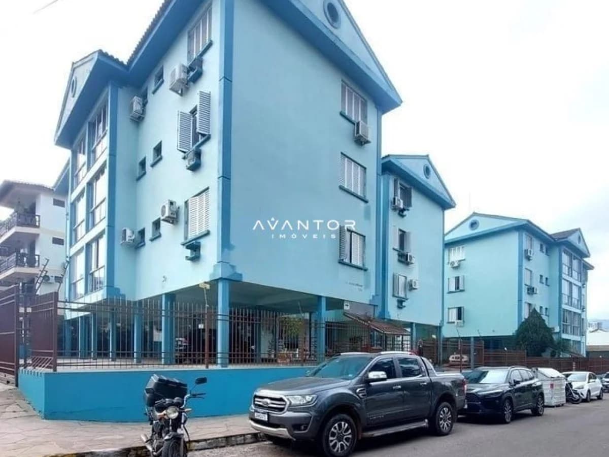 Fachada do prédio com garagem — Apartamento com 3 quartos à venda em Nossa Senhora de Lourdes, Santa Maria/RS