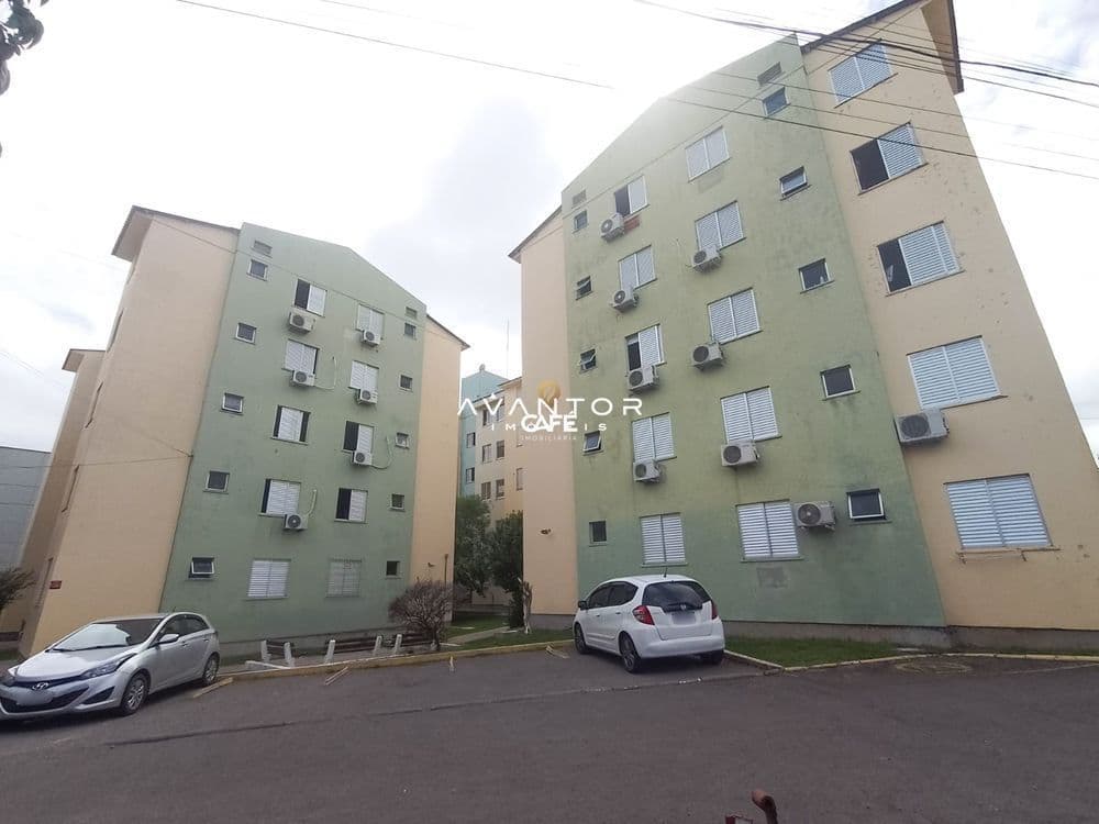 Fachada do prédio com garagem — Apartamento com 2 quartos à venda no Residencial Vento Norte, em Urlândia, Santa Maria/RS