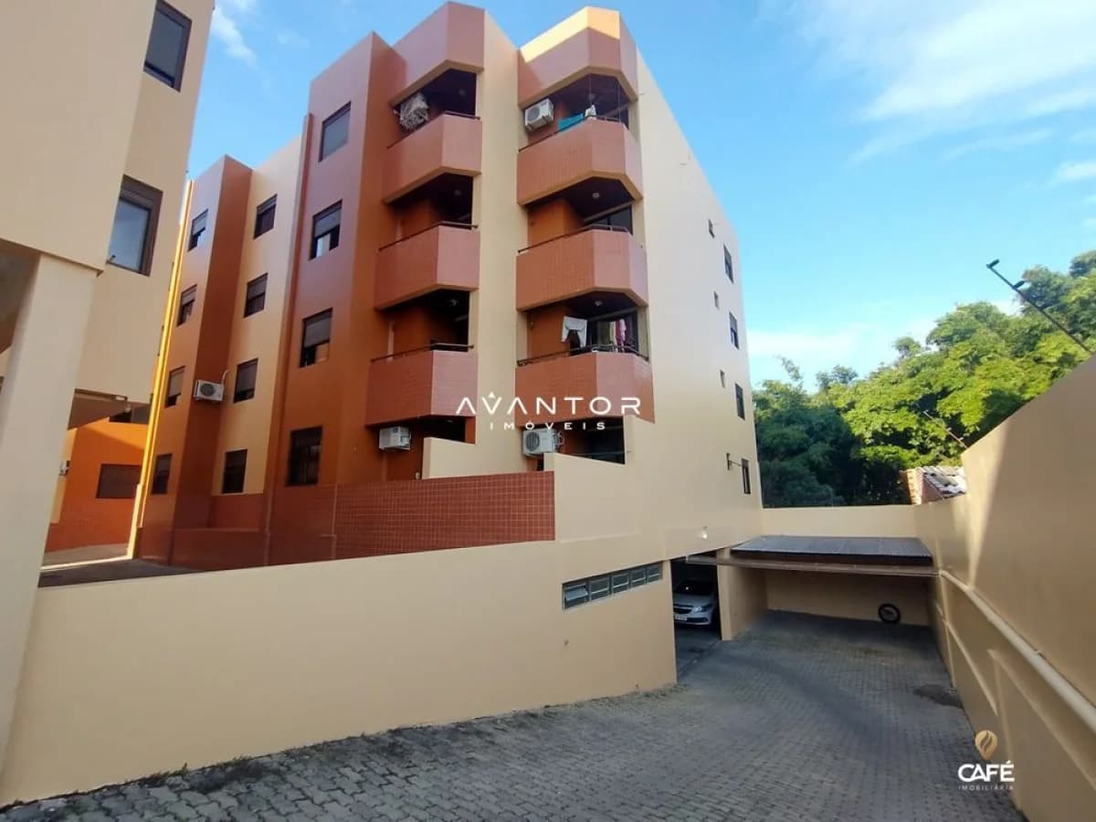 Fachada do prédio com garagem — Apartamento com 2 quartos à venda em Nossa Senhora de Lourdes, Santa Maria/RS