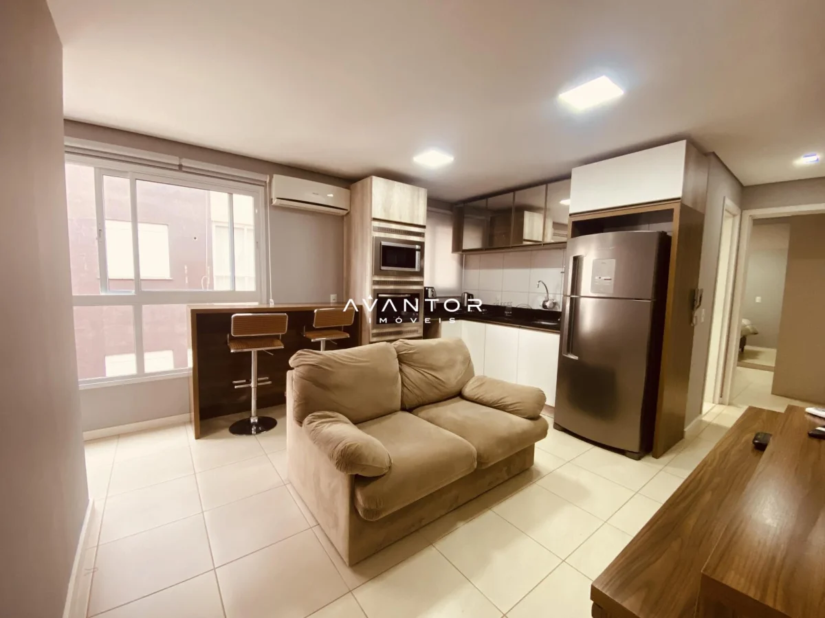 Sala de estar integrada à cozinha — Apartamento com 1 quarto à venda no Residencial Lorena, em Camobi, Santa Maria/RS