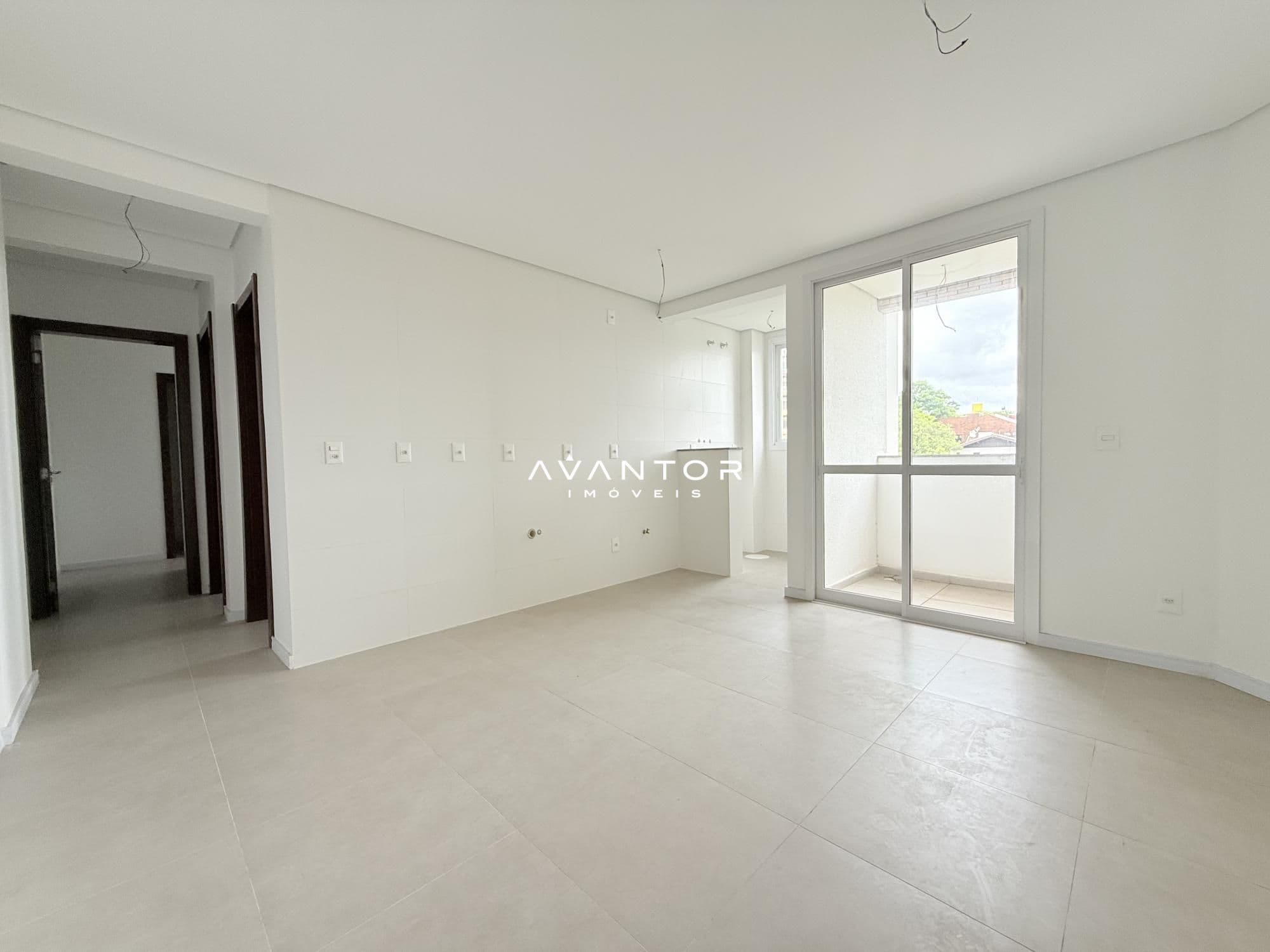 Sala de estar com sacada — Apartamento com 2 quartos à venda em Nossa Senhora de Lourdes, Santa Maria/RS
