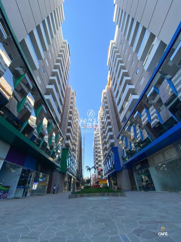 Fachada do edifício com logo de imobiliária — Sala Comercial com 1 sala para alugar em Centro, Santa Maria/RS