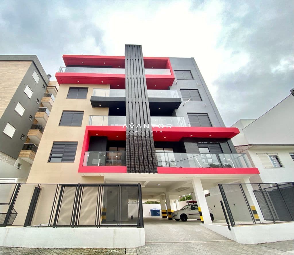 Fachada do prédio com sacadas vermelhas — Apartamento com 1 quarto à venda no Residencial Syrah, em Camobi, Santa Maria/RS