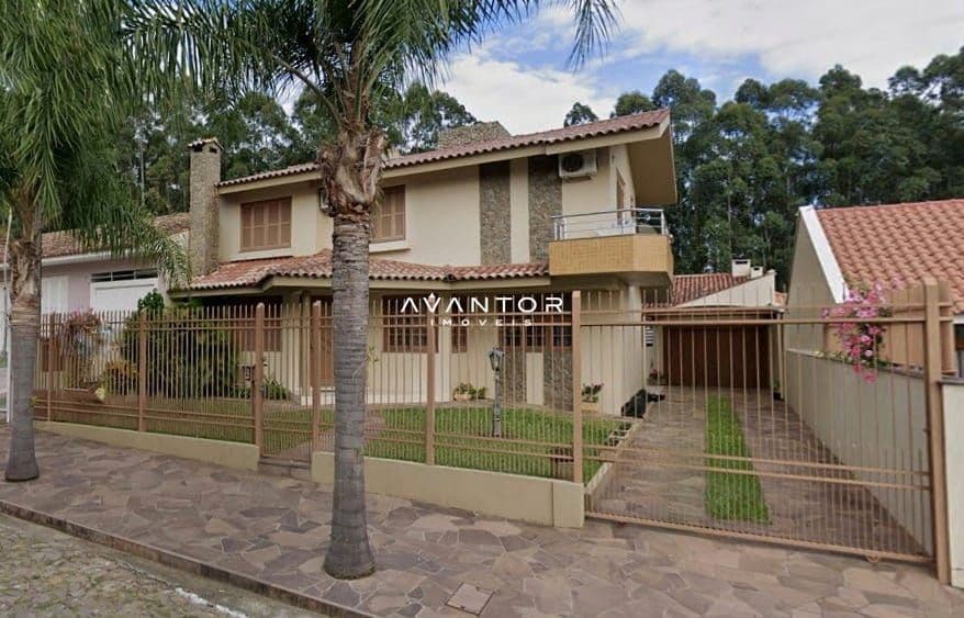 Fachada da casa com palmeira — Casa com 3 quartos à venda em São José, Santa Maria/RS