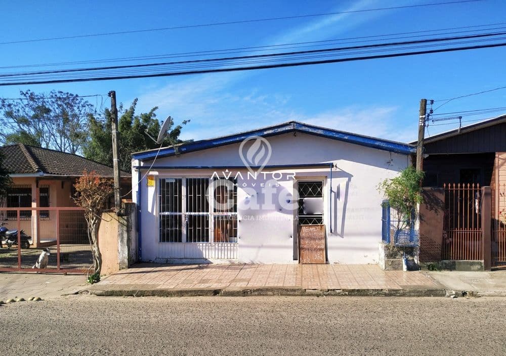 Fachada da casa com portão de ferro — Casa com 4 quartos à venda em Lorenzi, Santa Maria/RS