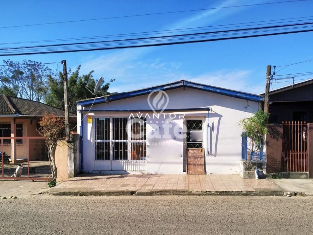 Fachada da casa com portão de ferro — Casa com 4 quartos à venda em Lorenzi, Santa Maria/RS