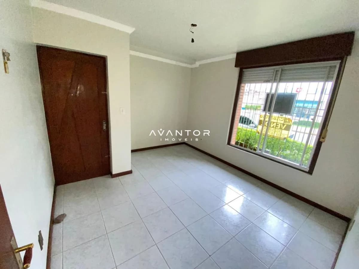 Sala de estar com acesso à sacada — Apartamento com 2 quartos à venda em Nossa Senhora de Fátima, Santa Maria/RS