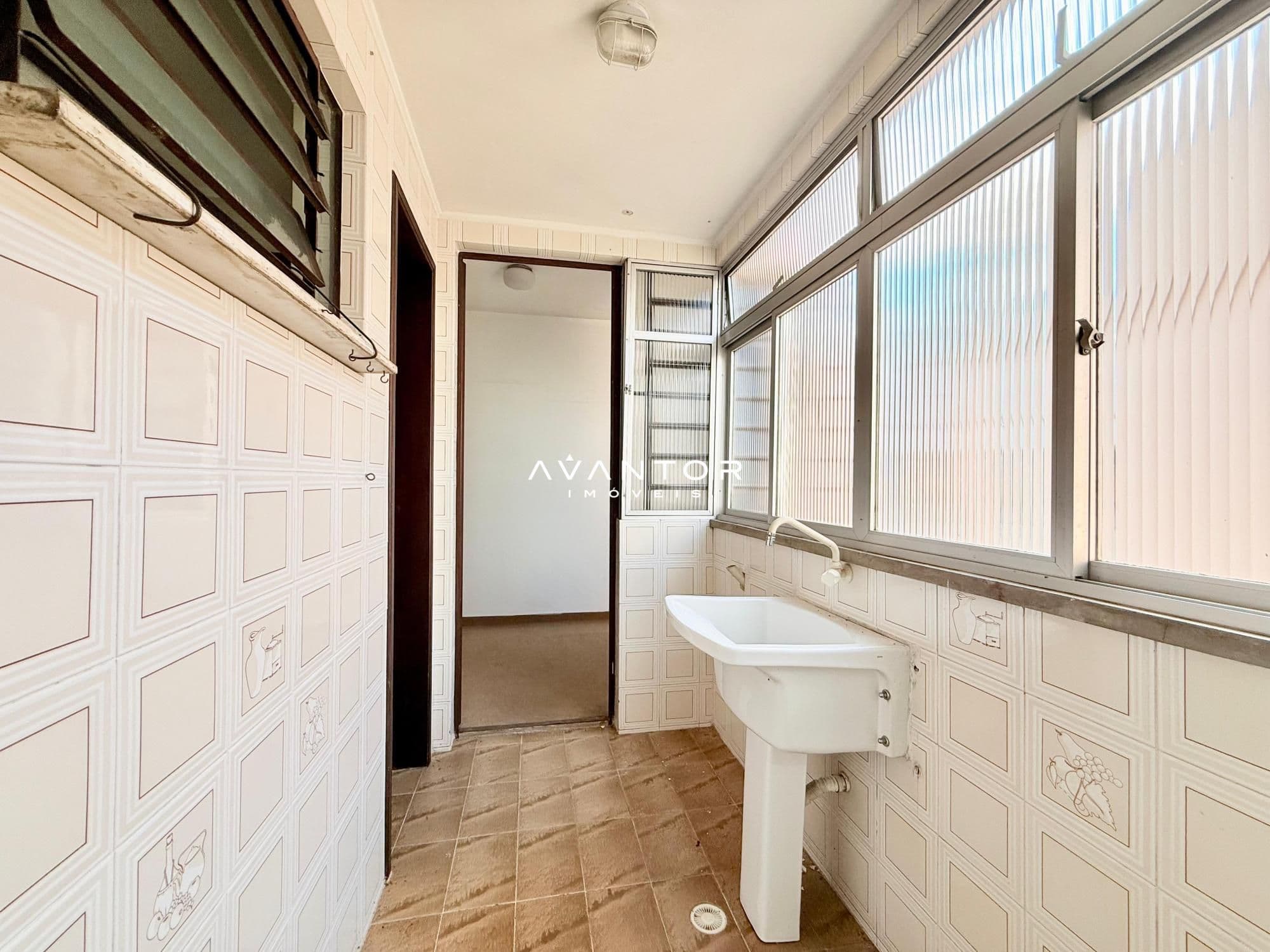ÁREA DE SERVIÇO — Apartamento com 3 quartos à venda no Edifício Talismã, em Centro, Santa Maria/RS