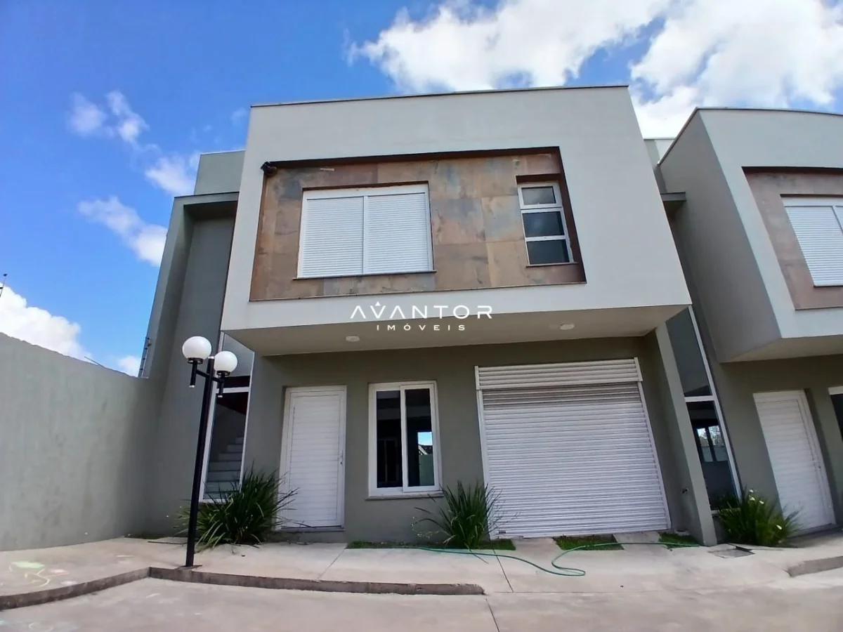 Fachada da casa com garagem — Casa com 3 quartos à venda em Diácono João Luiz Pozzobon, Santa Maria/RS