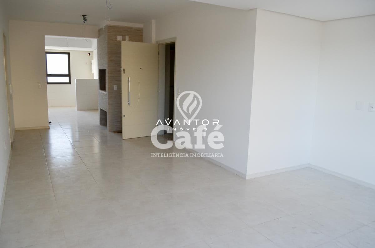 Sala integrada à cozinha com piso em porcelanato — Apartamento com 3 quartos à venda em Menino Jesus, Santa Maria/RS