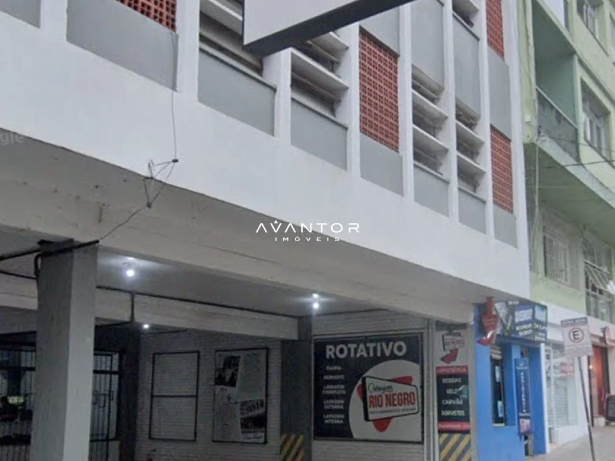 Fachada do prédio com comércios — Edificio Rio Negro, Bonfim, Santa Maria/RS