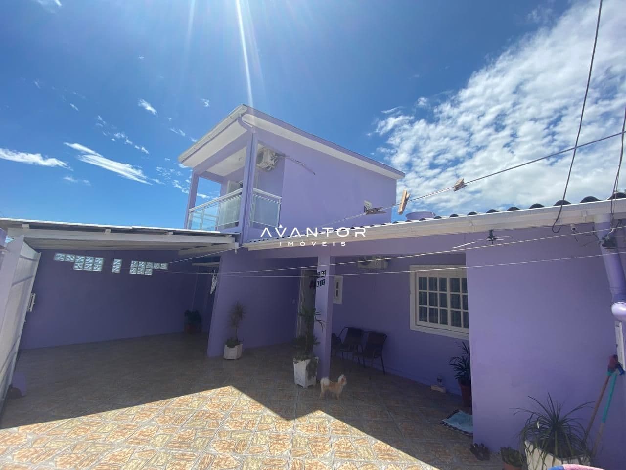 Fachada da casa com garagem — Casa com 3 quartos à venda em Tancredo Neves, Santa Maria/RS