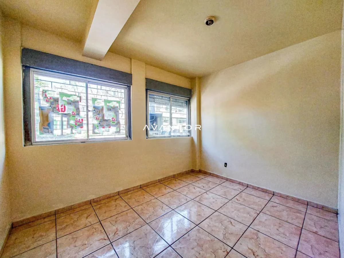 Dormitório com janelas para rua — Apartamento com 1 quarto à venda em Nossa Senhora de Fátima, Santa Maria/RS