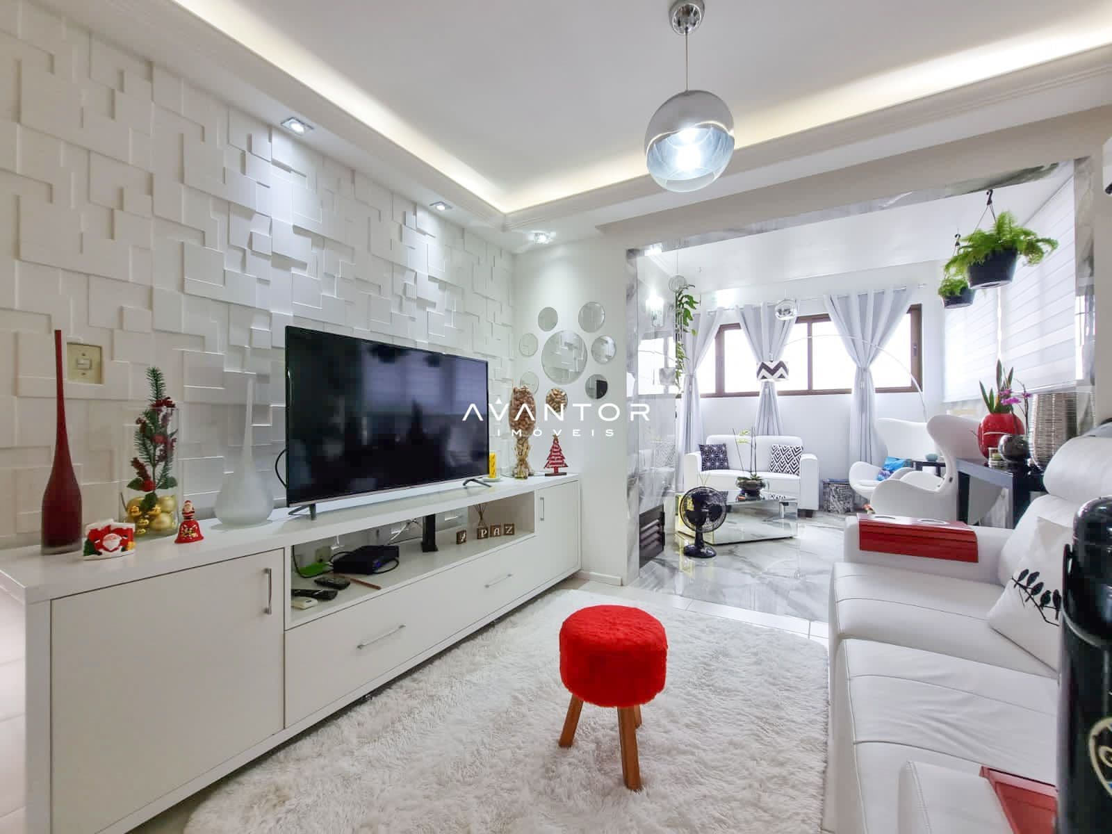 Sala de estar com parede revestida em pastilha — Apartamento com 2 quartos à venda em Dom Antônio Reis, Santa Maria/RS