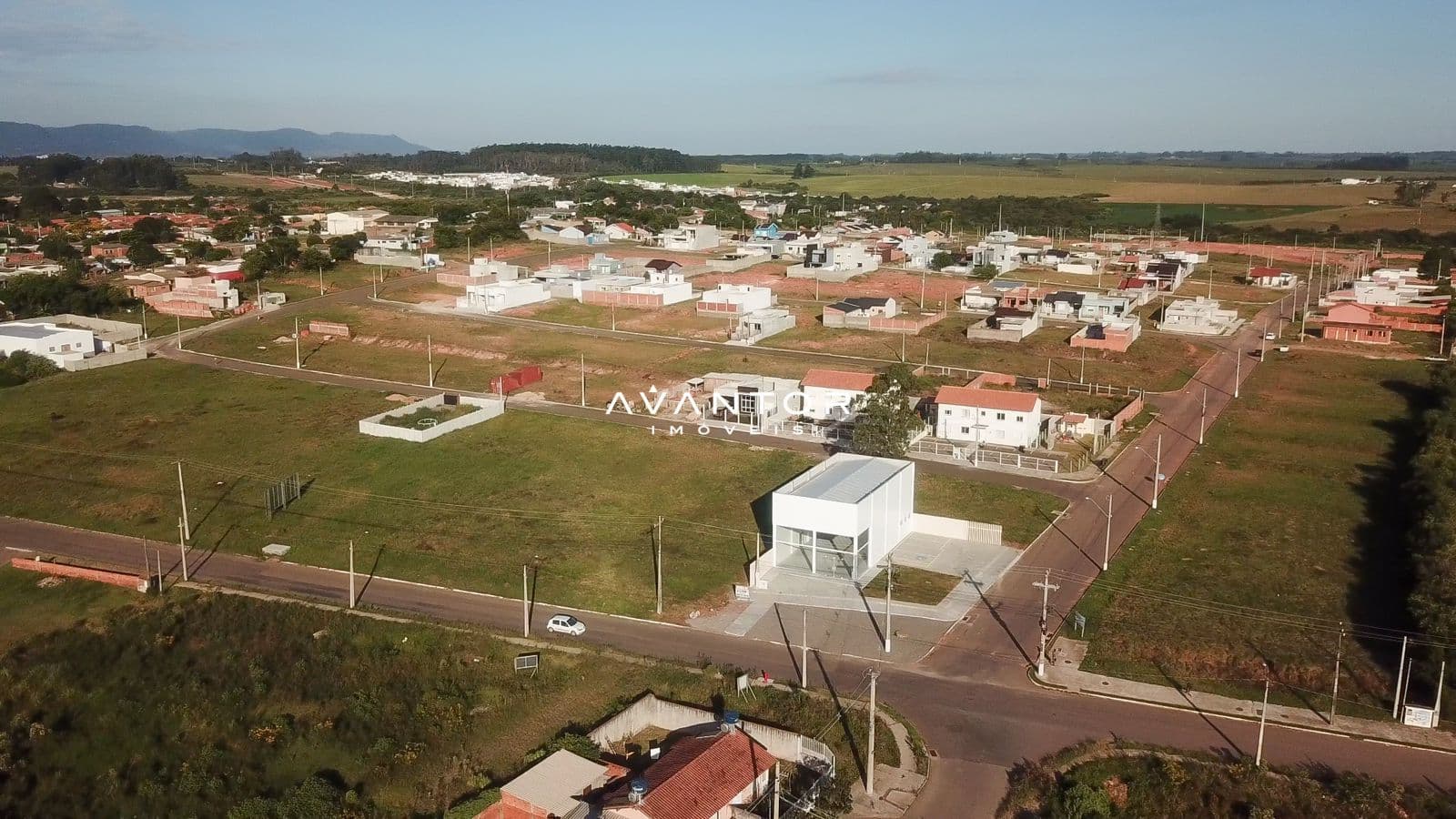 Vista aérea do loteamento e entorno — Terreno à venda no Galápagos Residencial, em Diácono João Luiz Pozzobon, Santa Maria/RS