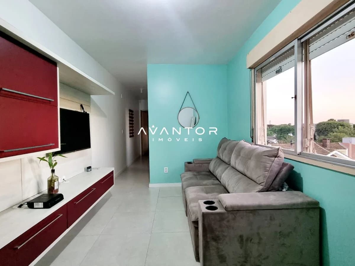 Sala de estar integrada à cozinha com sacada — Apartamento com 1 quarto à venda em Noal, Santa Maria/RS