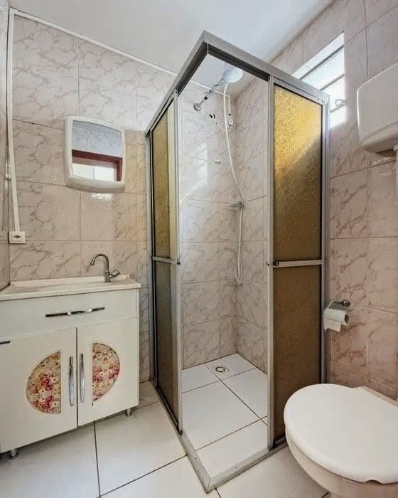 Apartamento Central de 1 dormitório, sala de estar, banheiro social, cozinha e área de ser — Apartamento com 1 quarto para alugar em Centro, Santa Maria/RS