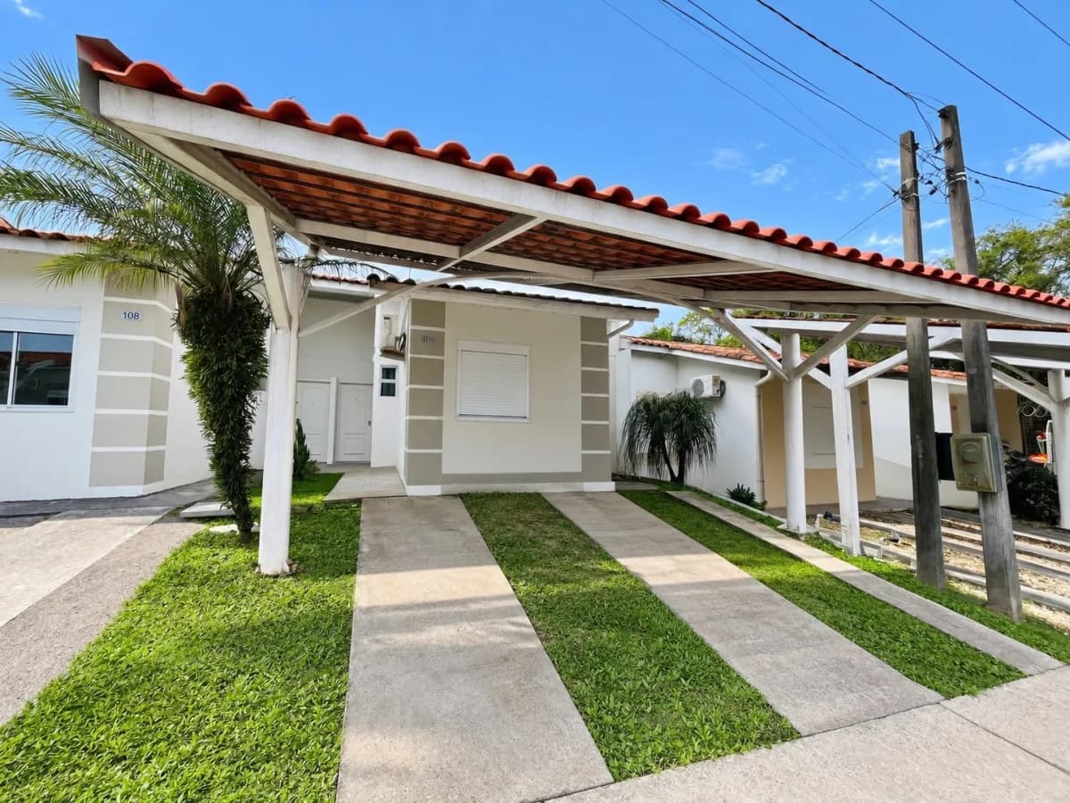 Fachada da casa com garagem coberta — Casa com 2 quartos à venda no Residencial Terra Nova, em Cerrito, Santa Maria/RS