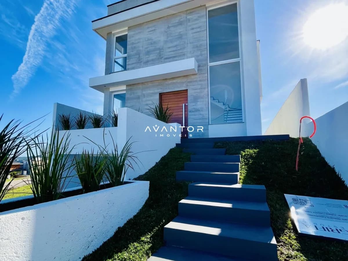 Fachada da casa com entrada frontal — Casa com 3 quartos à venda no Residencial Real Park, em Tomazetti, Santa Maria/RS