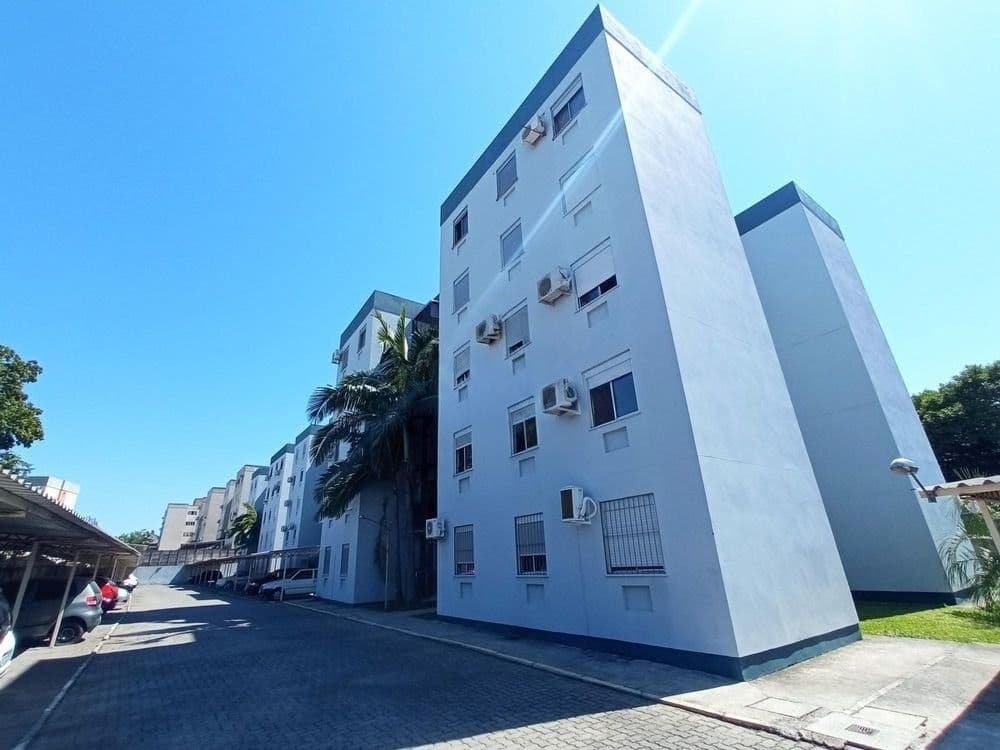 Apartamento térreo de 3 dormitórios, sala de estar, banheiro social, cozinha, área de serv — Apartamento com 3 quartos para alugar em Nossa Senhora do Rosário, Santa Maria/RS
