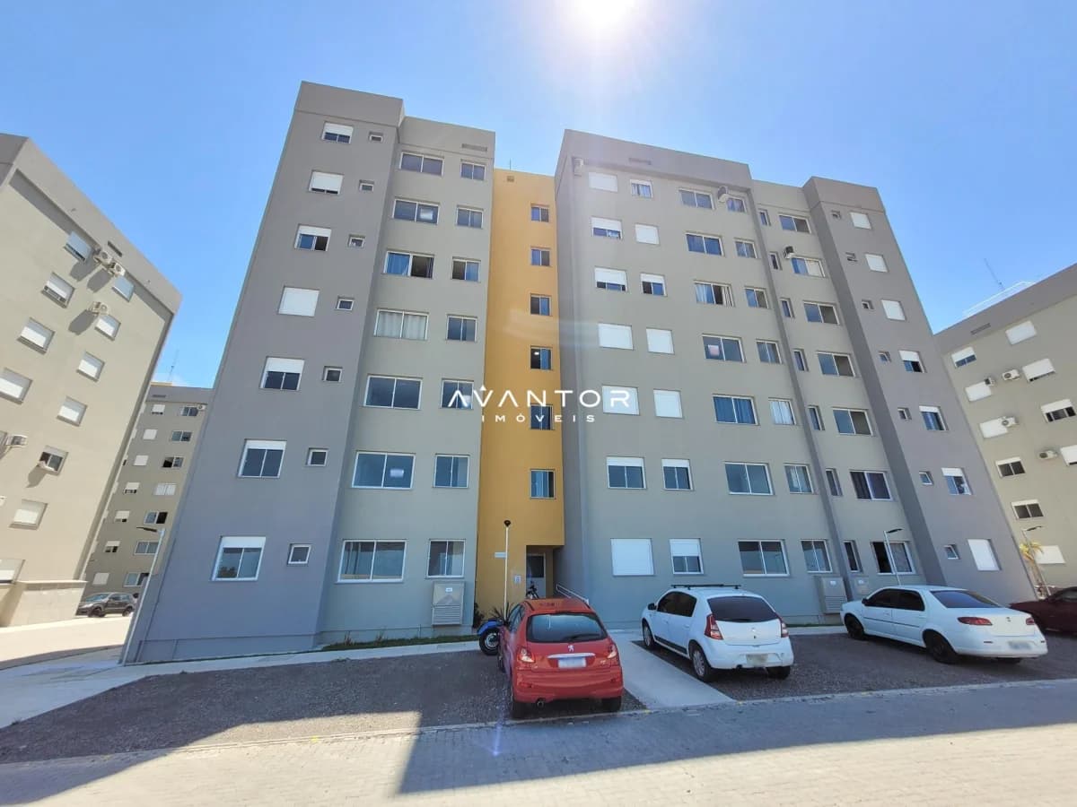 Fachada do prédio com garagem — Apartamento com 2 quartos à venda no Residencial La Spezia, em Patronato, Santa Maria/RS
