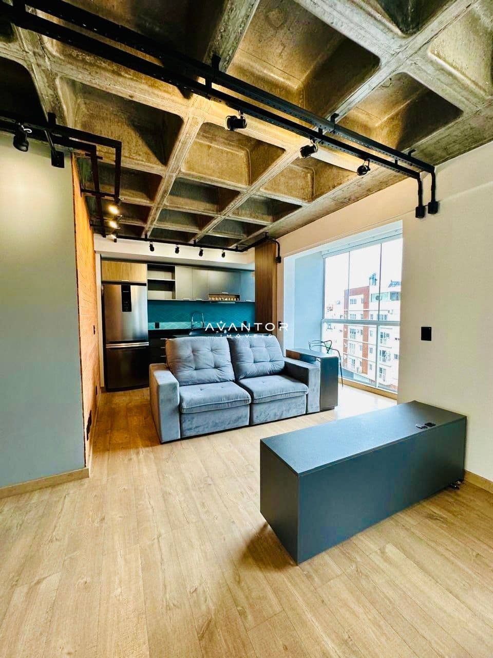 Sala integrada à cozinha com sacada — Apartamento com 1 quarto à venda em Nossa Senhora Medianeira, Santa Maria/RS