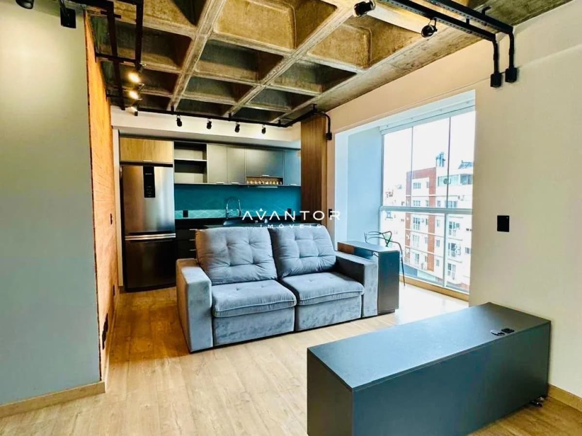 Sala integrada à cozinha com sacada — Apartamento com 1 quarto à venda em Nossa Senhora Medianeira, Santa Maria/RS
