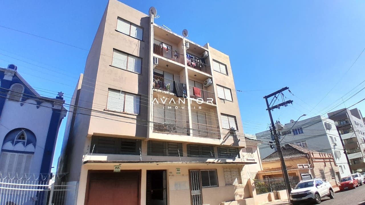 Fachada do prédio com garagem — Apartamento com 1 quarto à venda em Centro, Santa Maria/RS