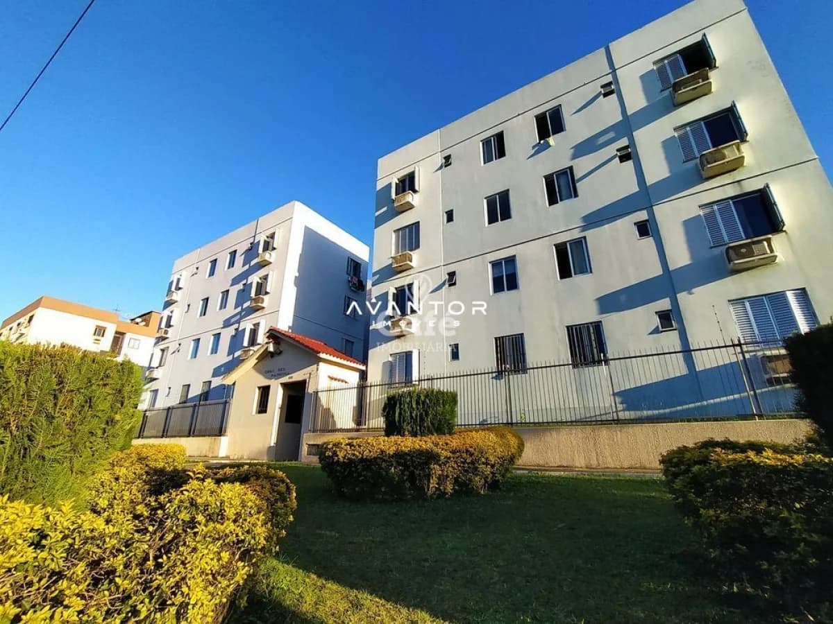 Fachada do prédio com sacadas — Apartamento com 2 quartos à venda em Nossa Senhora de Lourdes, Santa Maria/RS