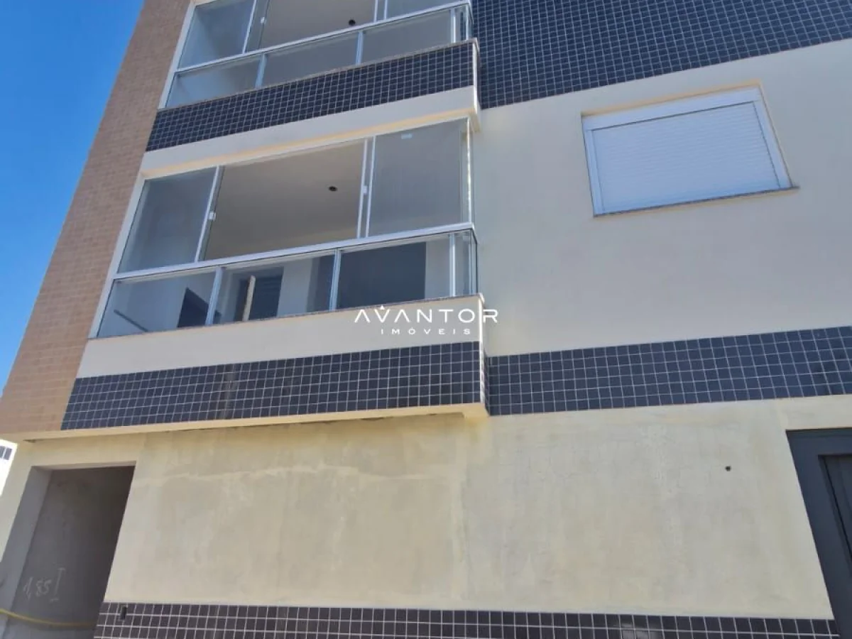Fachada do prédio com sacadas e painéis solares — Apartamento com 2 quartos à venda em Nossa Senhora do Rosário, Santa Maria/RS