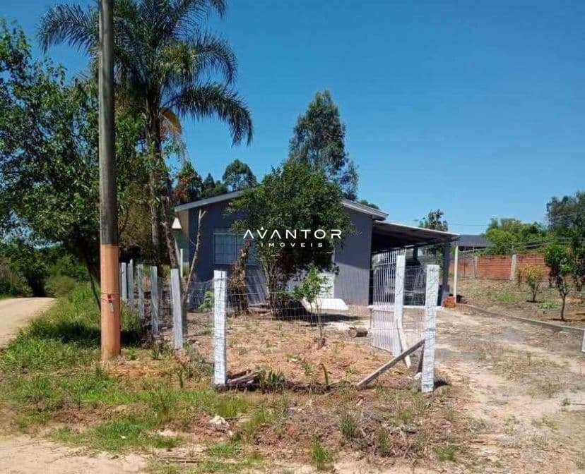 Fachada da casa com terreno — Terreno à venda em Boca do Monte, Santa Maria/RS