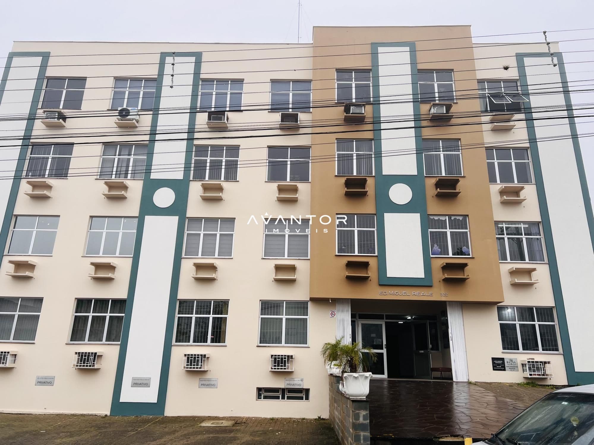 Fachada do prédio com acabamento colorido — Sala Comercial com 2 salas à venda em Nossa Senhora das Dores, Santa Maria/RS