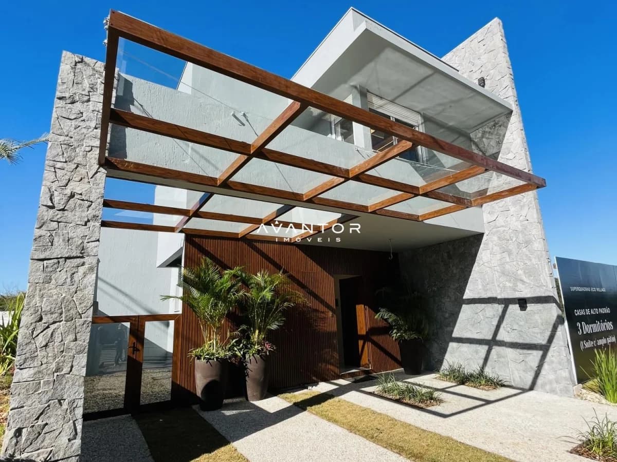 Fachada da casa com pergolado — Casa com 3 quartos à venda no Cidade Universitária, em Camobi, Santa Maria/RS