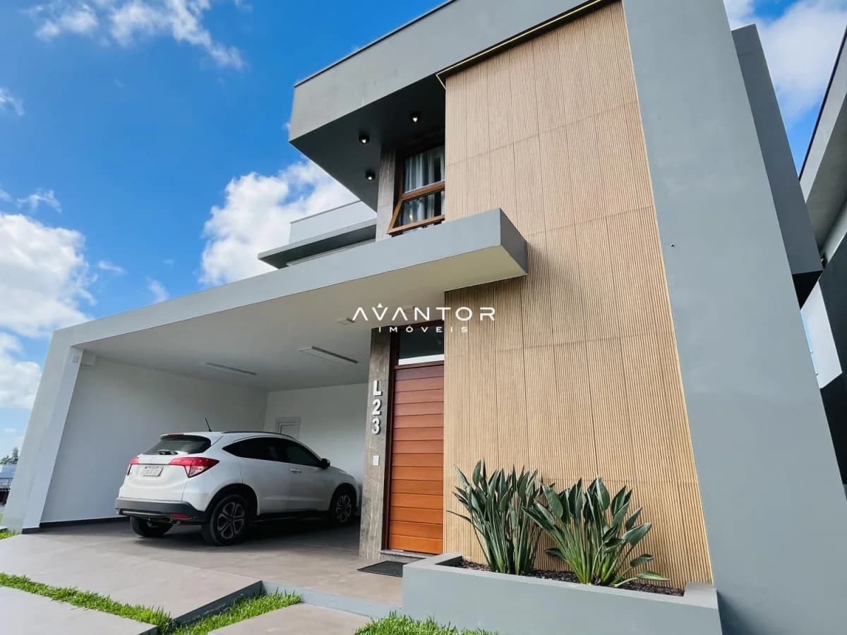 Fachada da casa com garagem — Casa com 4 quartos à venda no Residencial Real Park, em Tomazetti, Santa Maria/RS