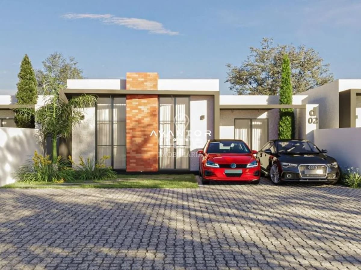 Fachada da casa com garagem — Residencial Prometeu Village, Diácono João Luiz Pozzobon, Santa Maria/RS