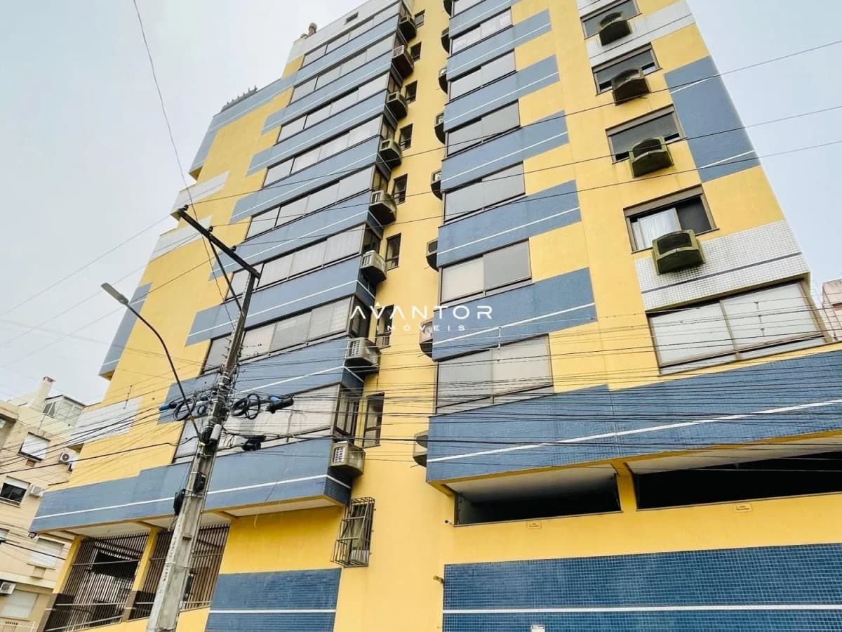 Fachada do prédio com acabamento amarelo e azul — Monte Magre, Menino Jesus, Santa Maria/RS