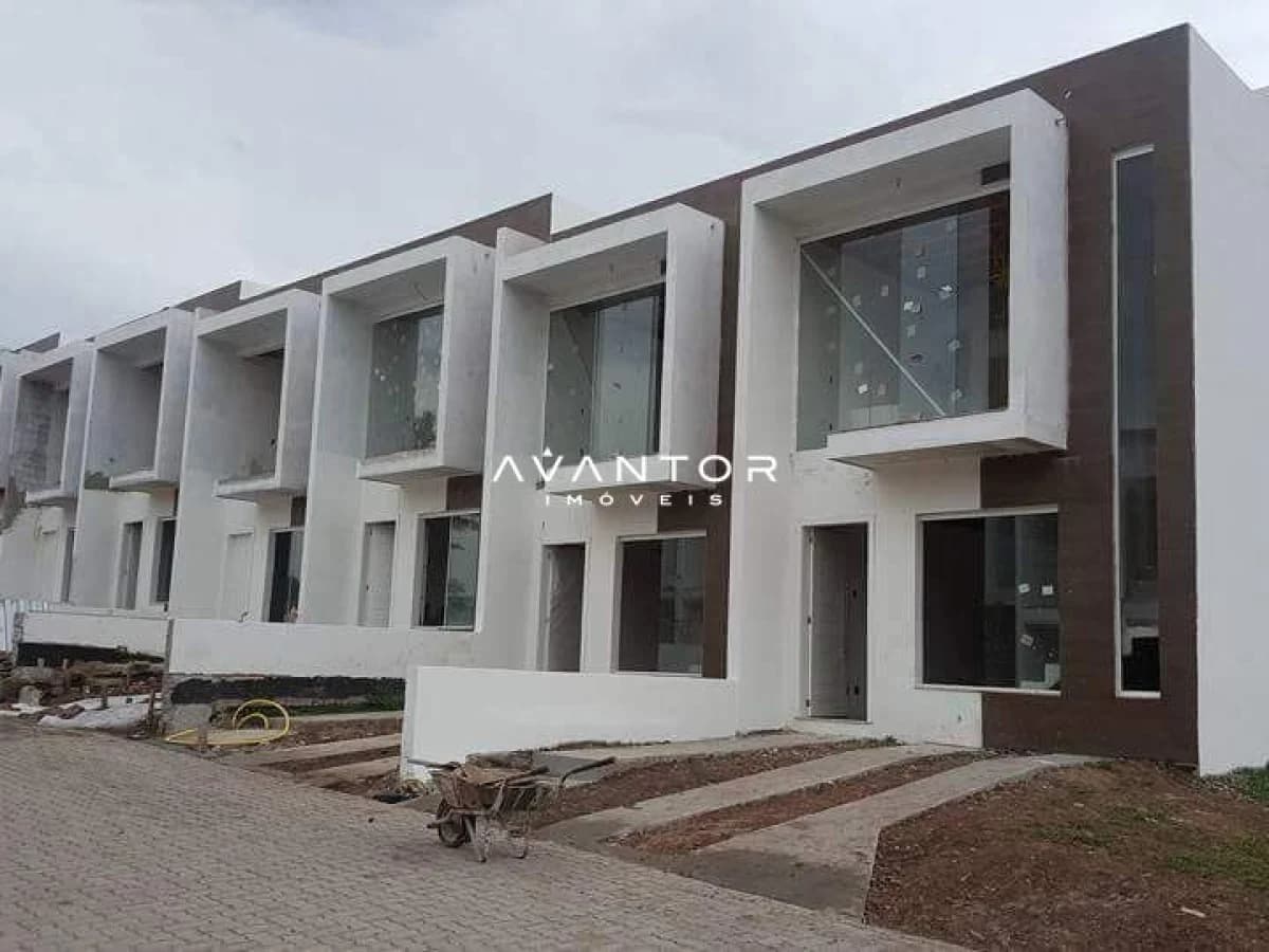 Fachada do condomínio com unidades geminadas — Casa com 2 quartos à venda em Diácono João Luiz Pozzobon, Santa Maria/RS
