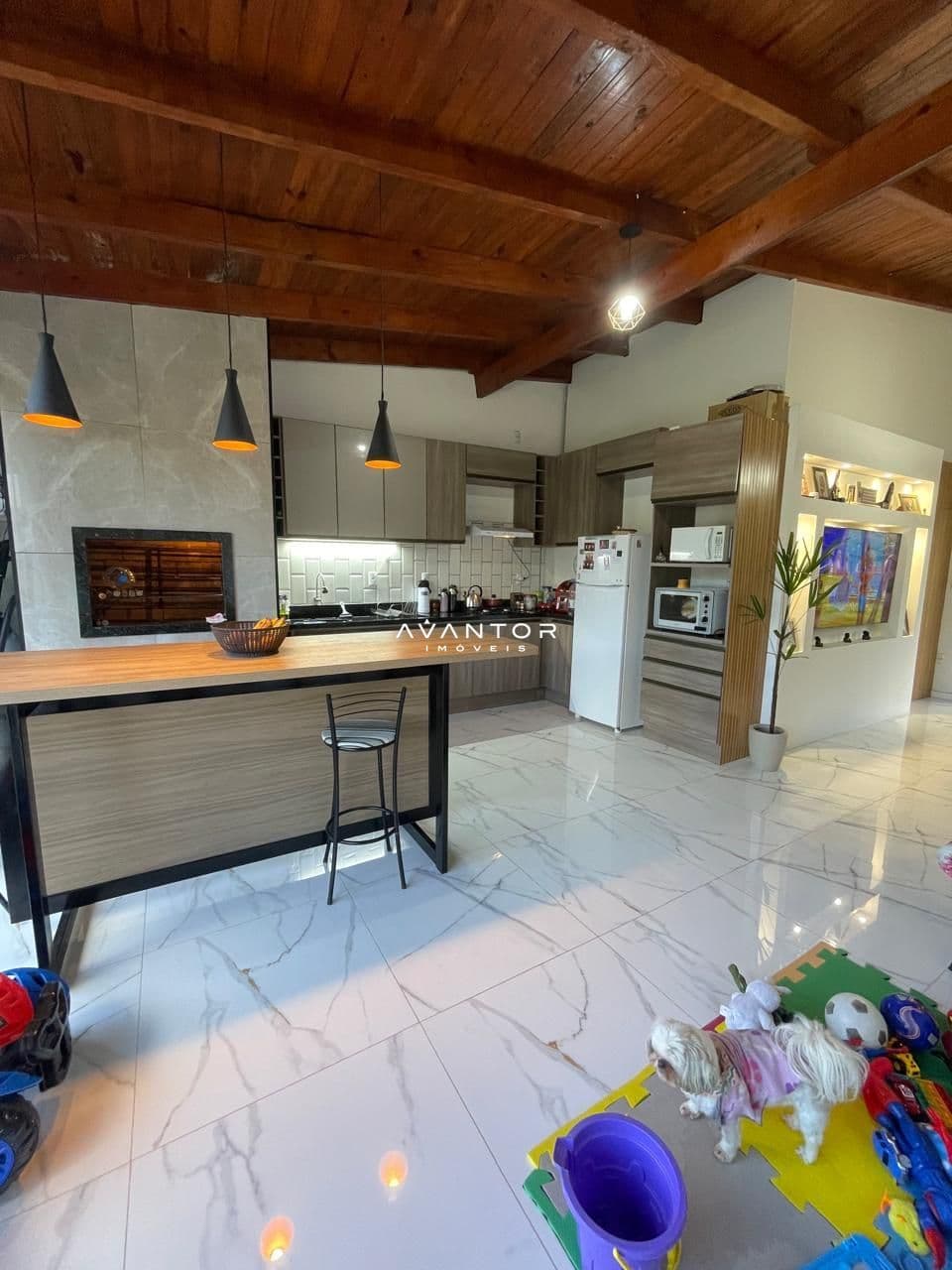 Cozinha integrada à sala com bancada — Casa com 2 quartos à venda em Campestre do Menino Deus, Santa Maria/RS