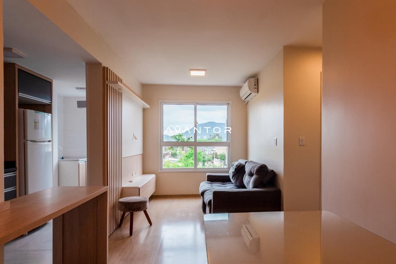 Sala de estar integrada à cozinha com janela — Apartamento com 2 quartos à venda em Noal, Santa Maria/RS